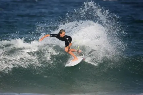 Luminar Neo Water Enhancer Surfer Before Example